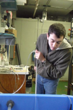 Devin Devour setting up the oxygen generator in the tank