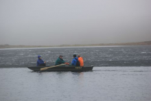 Researchers on boat