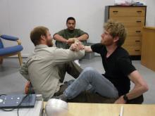 Mike Avery and Kasper playing a traditional Greenlandic game