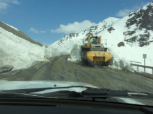 one lane of passage past the front end loader clearing an avalanche off the Dalt