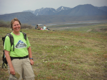 me on tundra with Atigun River and far mountains beyond