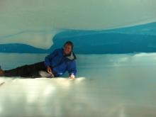 PolarTREC teacher Susan Steiner on an ice shelf formed from the aufeis