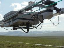 NIMS robotic sensor platform with Brooks Range in background, at Imnaviat site J