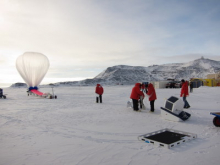 Connecting the experiments to the balloon.  