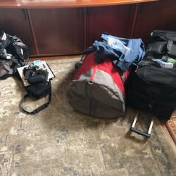 Two large bags and a daypack.  