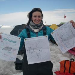 Dr. Michelle holding your flags