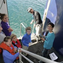 Gathering water column data at the side gate of NG Explorer