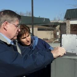 Roy and Claude with sat phone