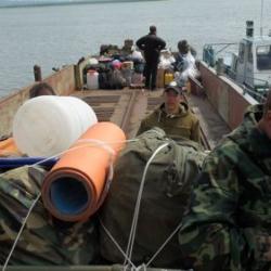 disembarking the barge for camp