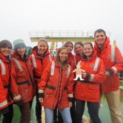 The students welcoming Flat Stanley aboard.