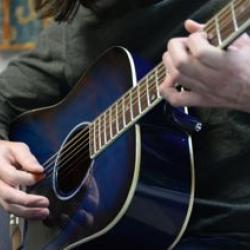 Brian playing guitar