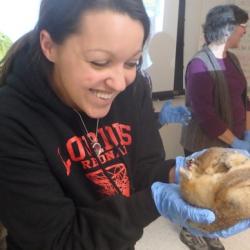 Kelly McCarthy holds an arctic ground squirrel.