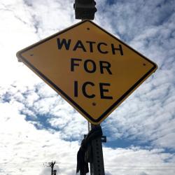 Watch For Ice sign on the street in Nome Alaska.  Photo by Lisa Seff.  August 23, 2017.