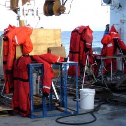 Mustang suits drying on deck after being washed.