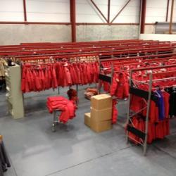 The army of Big Red coats at the Clothing Distrubution Center.