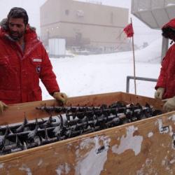 Preparing our crate of pipes and drill bits.