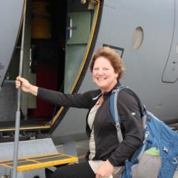 Sheryl Sotelo boarding the C130