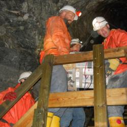 Lifting the Panel up the tunnel stairs.