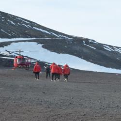 Team Walking to Helicopter